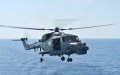 A Royal Malaysian Navy Super Lynx helicopter prepares to land